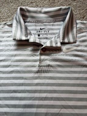 Boys size M Dri-fit Nike golf shirt